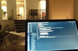 Me coding in Athens Impact Hub co-working space